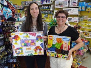 Jessi Wright, left (co-owner with Alan Read) of Big Smiles toy story in Smithers) recently donated two boxes of building blocks to the children of the Child Focus Africa Dormitory for special needs children in Migwani, Kenya. Judy Senka, Child Focus Africa Treasurer is on the right. These blocks will go to Migwani in august with some trekkers on their way to climb Mt. Klimanjaro with Adventure Africa. The blocks will be particularly valued since the children have virtually no toys. CFA wishes to thank Jessi and Alan for their generosity.